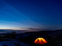 Tent and rocks at night (Seakayaking Sweden, August 2024)