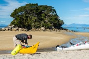 Craig unloading a kayak (Seakayaking Abel Tasman April 2021)