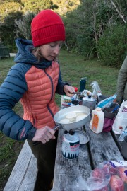 Ellen cooks pancakes (Seakayaking Abel Tasman April 2021)