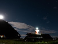Ellen at the picnic table in the evening (Seakayaking Abel Tasman April 2021)