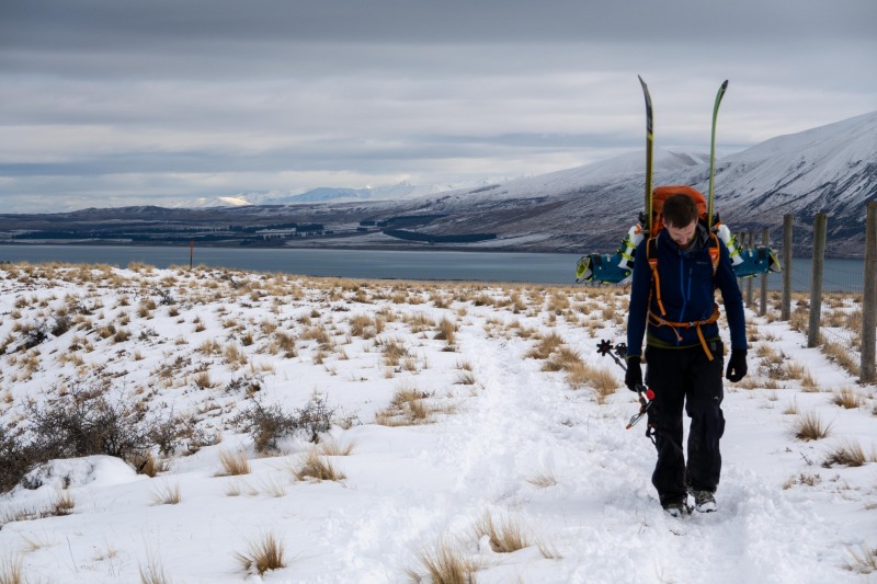 Craig walking with skis (Ski Touring Camp Stream Hut Aug 2021)