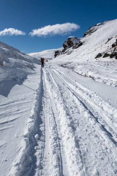 Heading along the snow farm tracks (Ski touring Kirtle Burn Hut August 2021)