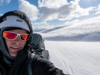 Cris in the wind (Ski touring Kirtle Burn Hut August 2021)