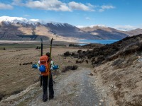 Craig walking down towards Lake Ohau (Ski Touring Snowy Gorge Hut Aug 2021)