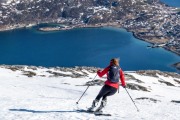 Hana skiing down (Ski Touring Tromso, April 2022)