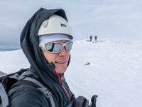 At the summit of Storbogtinden (Ski Touring Tromso, April 2022)