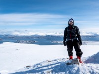 Cris at the top of Botnjfellet (Ski Touring Tromso, April 2022)
