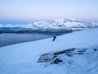 Cris skiing down (Ski Touring Tromso, April 2022)