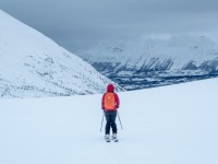 Hana skiing down (Ski Touring Tromso, April 2022)