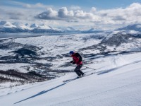 Hanna skiing down (Ski Touring Tromso, April 2022)