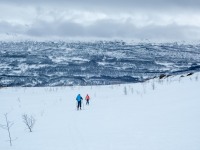 Johannes and Hana skiing down (Ski Touring Tromso, April 2022)