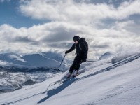 Johannes skiing down (Ski Touring Tromso, April 2022)