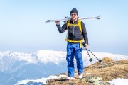 Daniel carries his skis (Ski touring Weidener Huette March 2022)