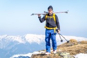 Daniel carries his skis (Ski touring Weidener Huette March 2022)