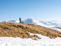 Helga at the summit of Nafingköpfl (Ski touring Weidener Huette March 2022)