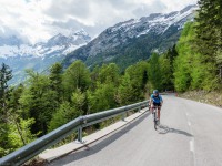 Leonie cycling up Vršič Pass (Slovenia 2019)