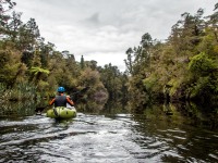 Craig packrafting down from Lake Ellery (Doof trip South Dec 2023)