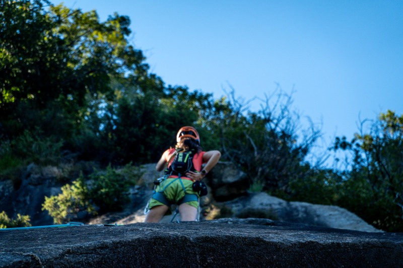 Ari leading a slabby climb (Summer Holidays in Ticino Aug 2025)