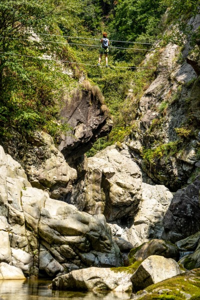 Ari crosses the rope bridge (Summer road trip August 2024)