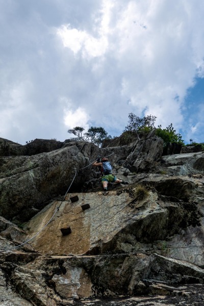 Ari doing a ferrata (Summer road trip August 2024)