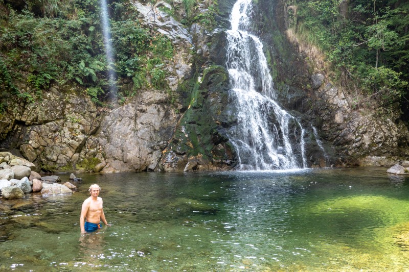 Cris in a pool of water (Summer road trip August 2024)