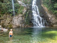 Cris in a pool of water (Summer road trip August 2024)