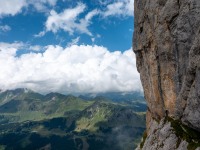 Cris starts the ferrata at the cliffs (Summer road trip August 2024)