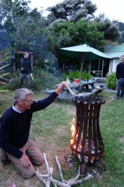 Dad tends the fire (Takaka 2013)