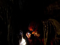 Pip climbing through a tight spot (Te Tahi cave Jan 2025)