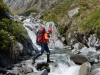 Chris crossing a stream (Hopkins Valley Tramp Jan 2015)