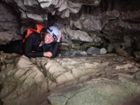 Rachel squeezes out the exit (Adventures with Craichel Jan 2022)