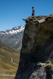 Jeremy on the rock above Rees Saddle (Tramping Rees Rees Dec 2021)