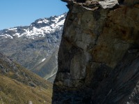 Jeremy on the rock above Rees Saddle (Tramping Rees Rees Dec 2021)