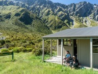 Making a hot drink outside Shelter Rock Hut (Tramping Rees Rees Dec 2021)