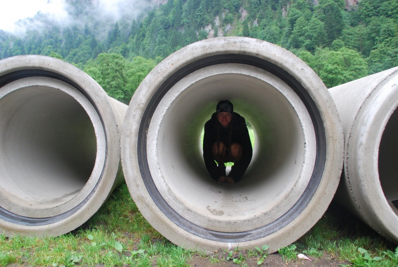 Frauke in a pipe (Tramping Schrecksee, Germany)