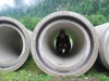 Frauke in a pipe (Tramping Schrecksee, Germany)