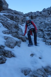 Leonie descending with crampons (Brenta Dolomites)