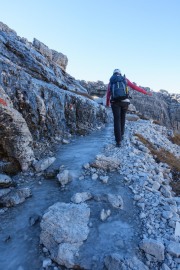 Leonie walking along an icey path (Brenta Dolomites 2016)