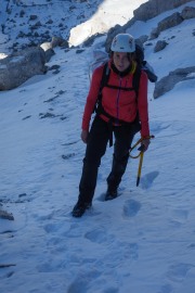 Leonie walking with ice axe (Brenta Dolomites)