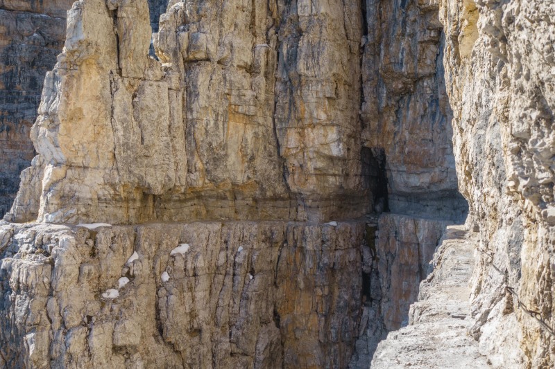 The via ferrata cut into the rock (Brenta Dolomites)