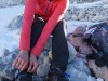 Leonie putting on her crampons (Brenta Dolomites)