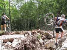 Carrying bikes through the rubble of a new road (Lago di Garda) resize