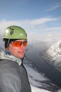 Cris on summit with fiord behind 2 (Rørnestinden, Norway) 2 resize