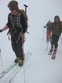 Ski touring in white out (Langdalstindane, Norway) resize