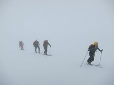 Trekking through the mist (Langdalstindane, Norway) resize