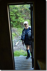 Katie at hut (Tramping Sudden Valley)
