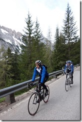 Thomas and Marco smiling on the way up the first pass (Cycling Dolomites)