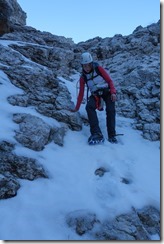Leonie descending with crampons (Brenta Dolomites)