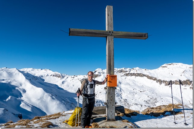 Cris at the summit (Ski touring Hueenerchopf Feb 2023)