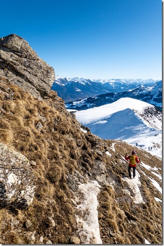 Hans descending back towards the snow (Ski touring Hueenerchopf Feb 2023)